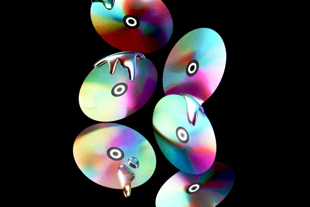 Abstract colorful cds are floating in the dark.